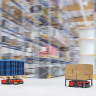 Two C-MATICs from Linde MH drive through the warehouse