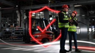Linde Material Handling safety experts working at a customer’s premises.
