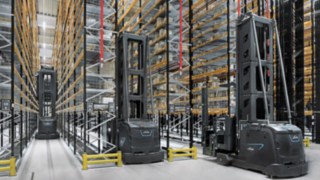 Several Linde MH very narrow aisle trucks in a warehouse