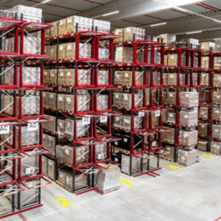 A row of high shelving in a warehouse.