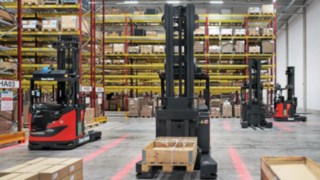 The R-MATICs from Linde MH wait in front of the rack for their next driving assignment.