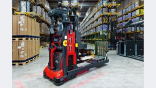 The Robotic Case Picker (RoCaP) from Linde MH in a warehouse with multi-axis gripper arm for autonomous order picking